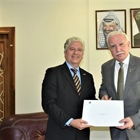 الوزير المالكي يستقبل السفير البرازيلي ويتسلم دعوة رسمية لزيارة البرازيل